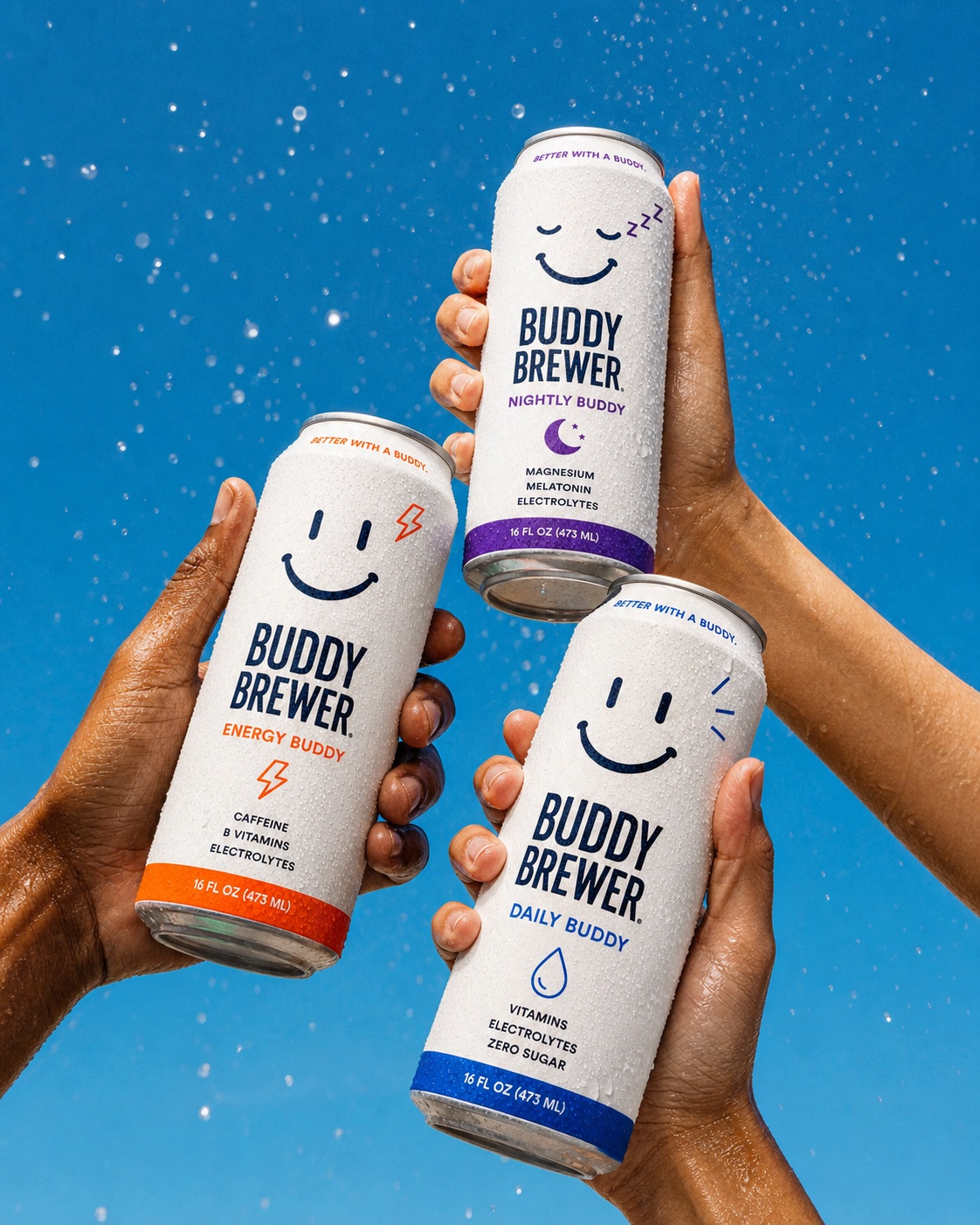 Three hands raise Morning, Daily, and Nightly Buddy cans together beneath sparkling water droplets.